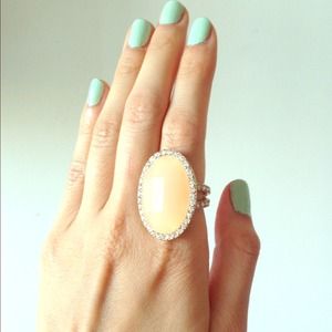 Cocktail ring with peach center stone