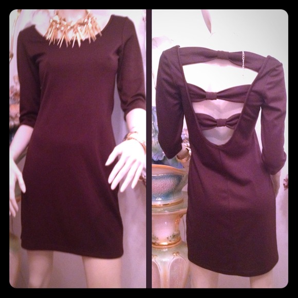 Brown Dress with the Three Peep Hole at the Back