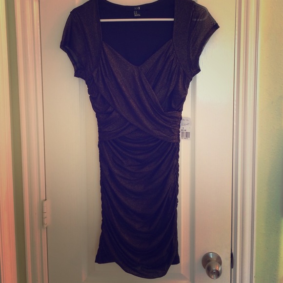 Perfect little black dress with a gold sparkle!