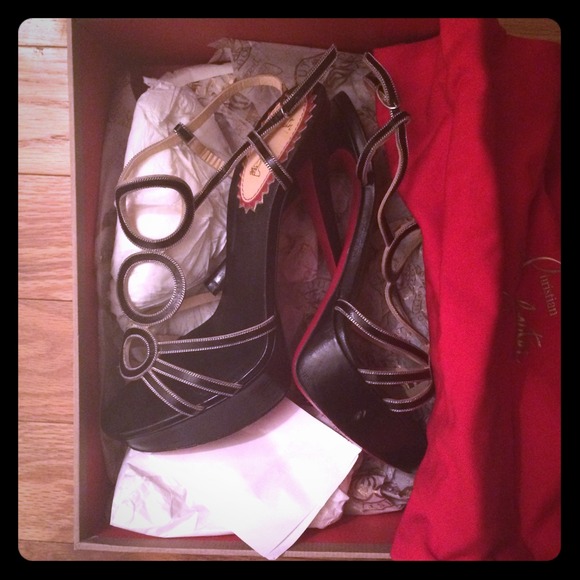 Christian Louboutin size 7 1/2 (worn once)