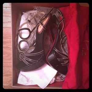 Christian Louboutin size 7 1/2 (worn once)