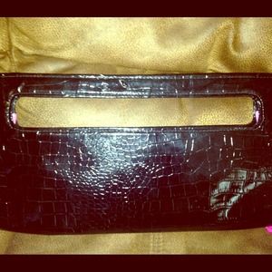 Giannini leather clutch
