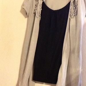 Black shirt with grey cardigan.