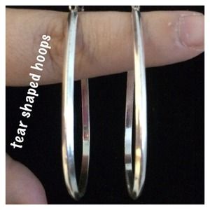 4 for $15 Tear shaped hoops silver in color