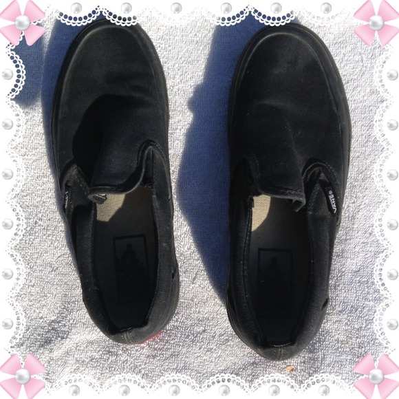 All black Slip on Vans