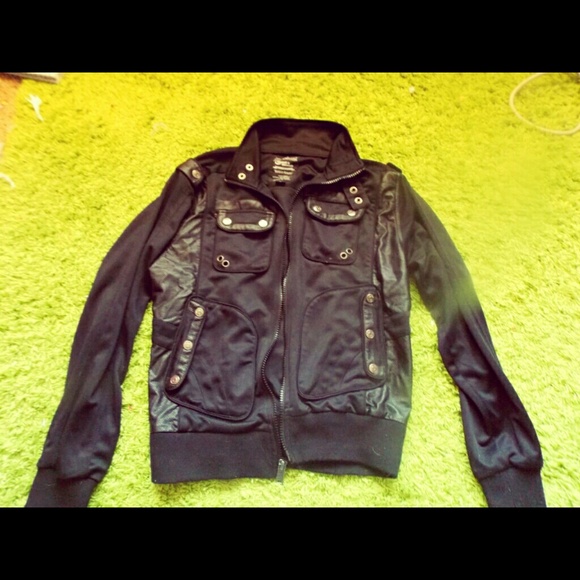 Unisex Black faux leather motorcycle jacket.
