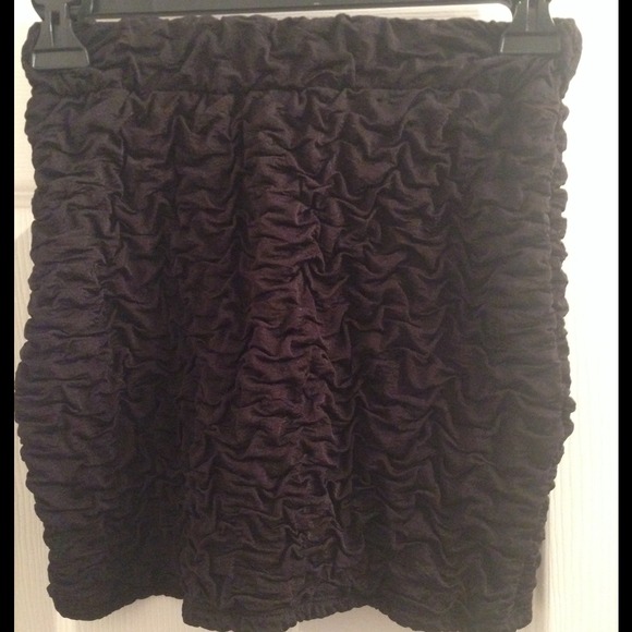 Black ruffled mini skirt