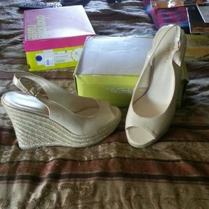 Beige wedge sling backs.