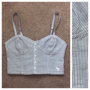 Navy blue and white striped, bustier crop top.