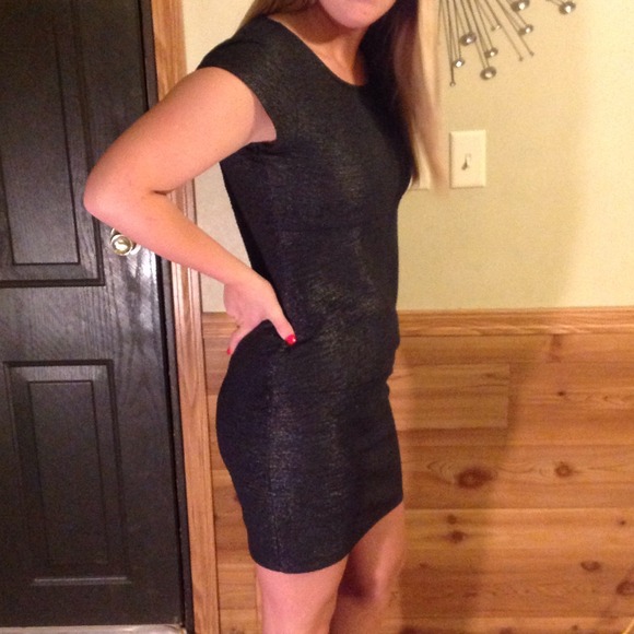 Black dress w/ a silver tone that makes it shine