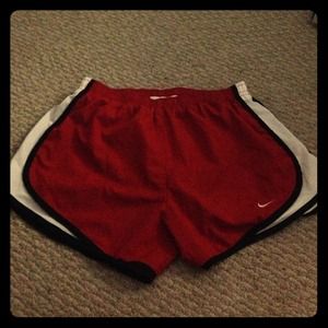 Red Nike running shorts