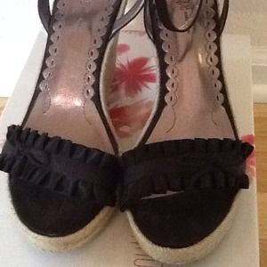 Black wedge sandals with grosgrain & satin trim.