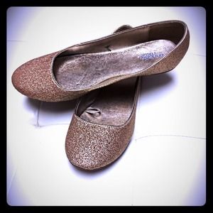 Gold glitter flats.