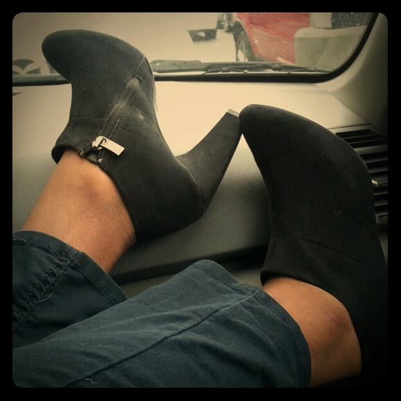 Black heeled short boot-type shoe