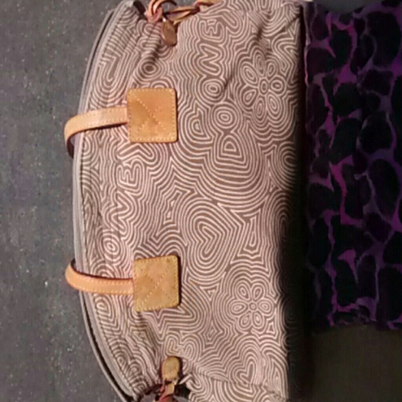 Dooney & Bourke handbag with neon pink interior