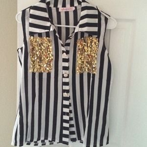 Black and white striped blouse with gold pockets