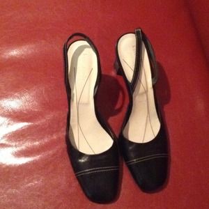 Black sling back pumps