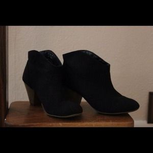 JustFab black ankle booties.