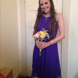 A super cute purple dress with sequins!