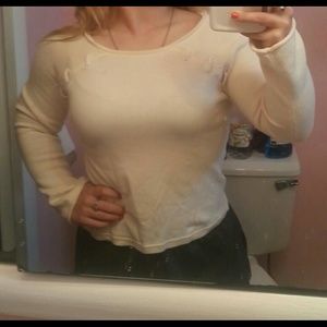 Cream shirt with little stitches on it!