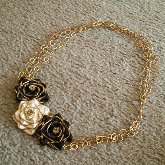 Gold necklace with b and w roses