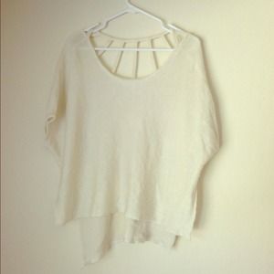 Lush oversized knot sweater type poncho