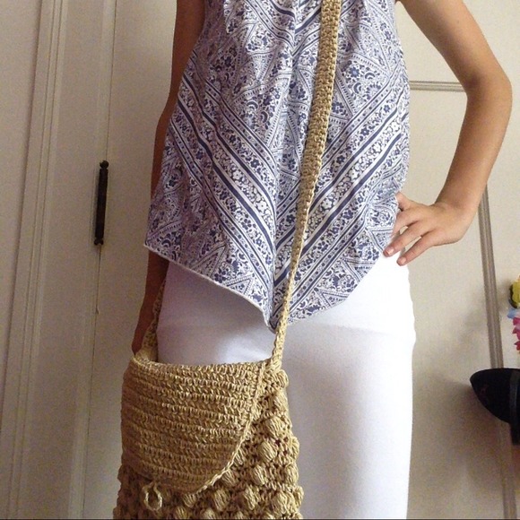 Tan cross-the-body purse