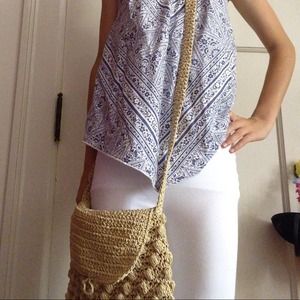 Tan cross-the-body purse