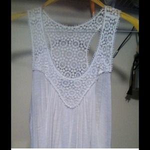 White top with crochet detail. This price is firm