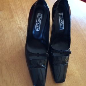 Moschino black patent leather pumps.