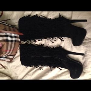 Knee high fringe boots