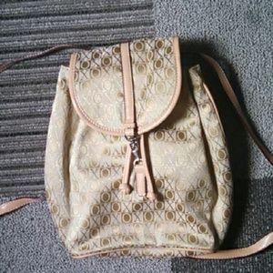 Xoxo gold and tan mini backpack