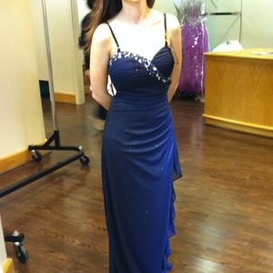 I am selling a strapless blue formal dress.