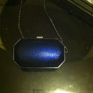 A blue shimmery clutch
