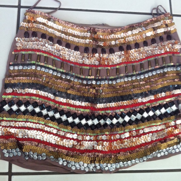 Embroidered mini skirt.