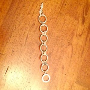 Rose gold colored VS circular bracelet