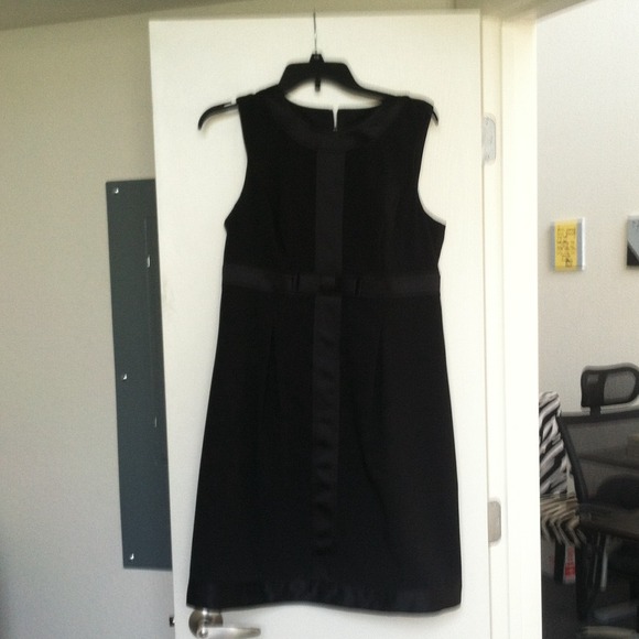 Black cocktail dress with bow
