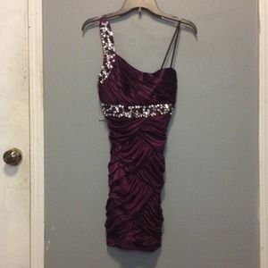 A short purple dress.