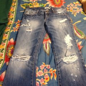 Light blue destroyed flare jeans