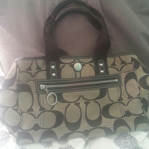 Coach bag with pink lining