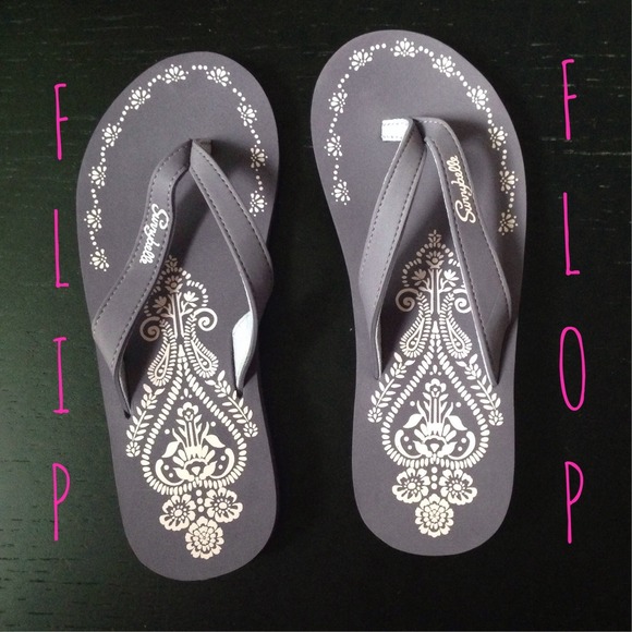 Purple boho print flip flops