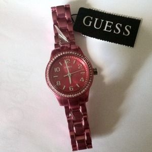 Small, pink, Guess watch.
