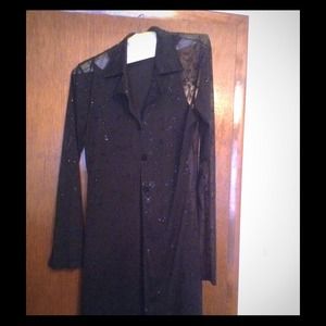 Black knee length dress.