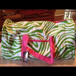 Green and white zebra stripes with pink handles