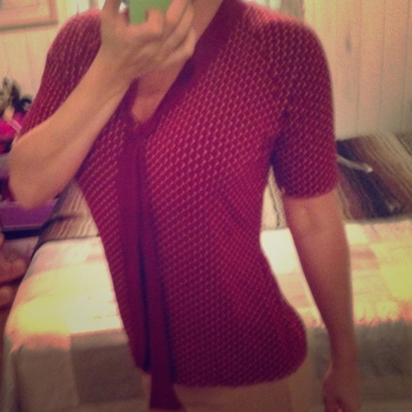 Beige polkadots on maroon shirt