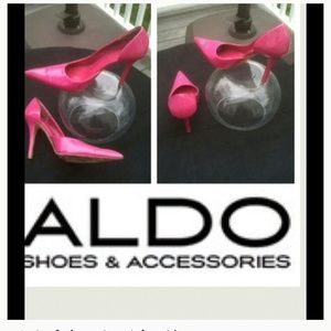 Hot pink patent leather pumps