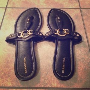 Black sandals that have never been worn