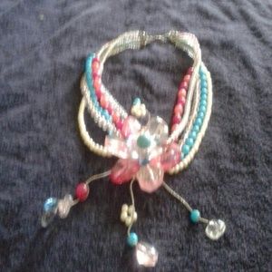 necklace.five strings..turquoise pink and white