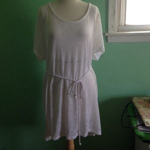 Never worn. Semi sheer white cover up.
