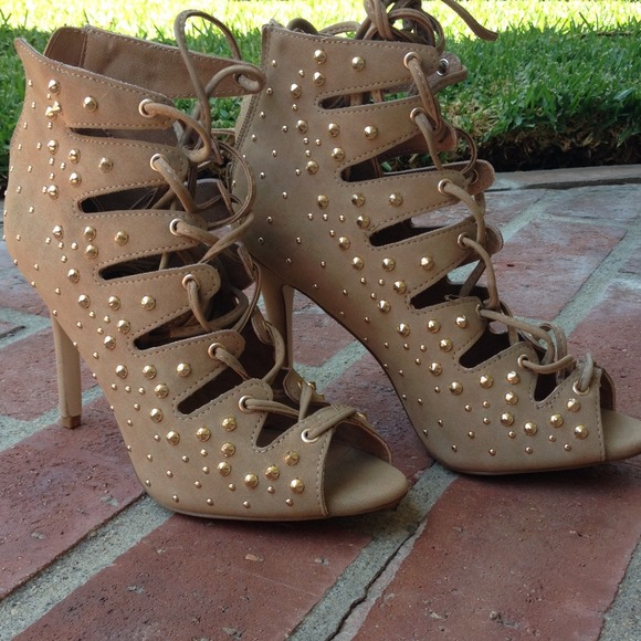 Gold studs on nude lace up heels